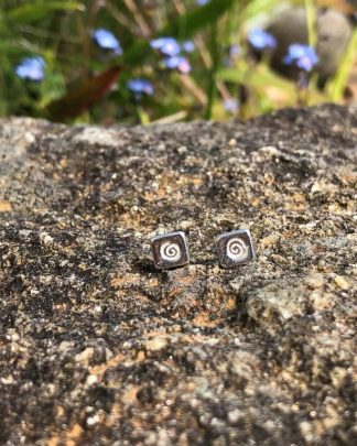 Mini silver swirl stud earrings